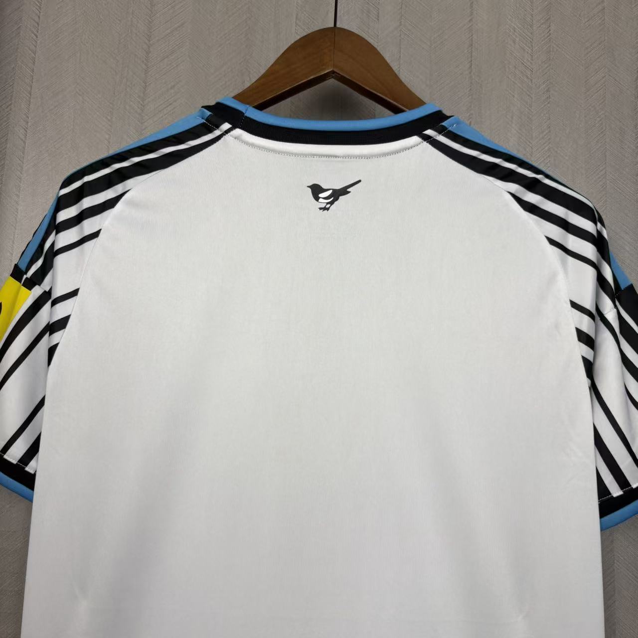 Camisola Newcastle principal 2026/27