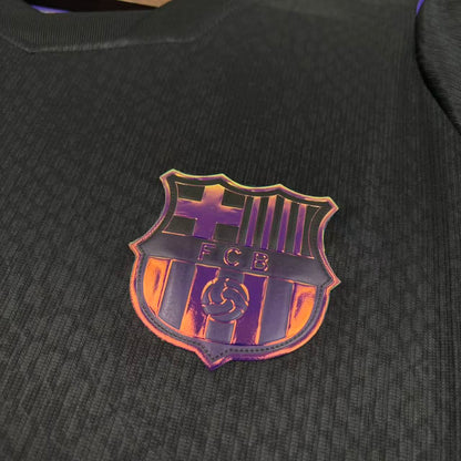 Camisola Barcelona alternativa preta e roxa 2026/27