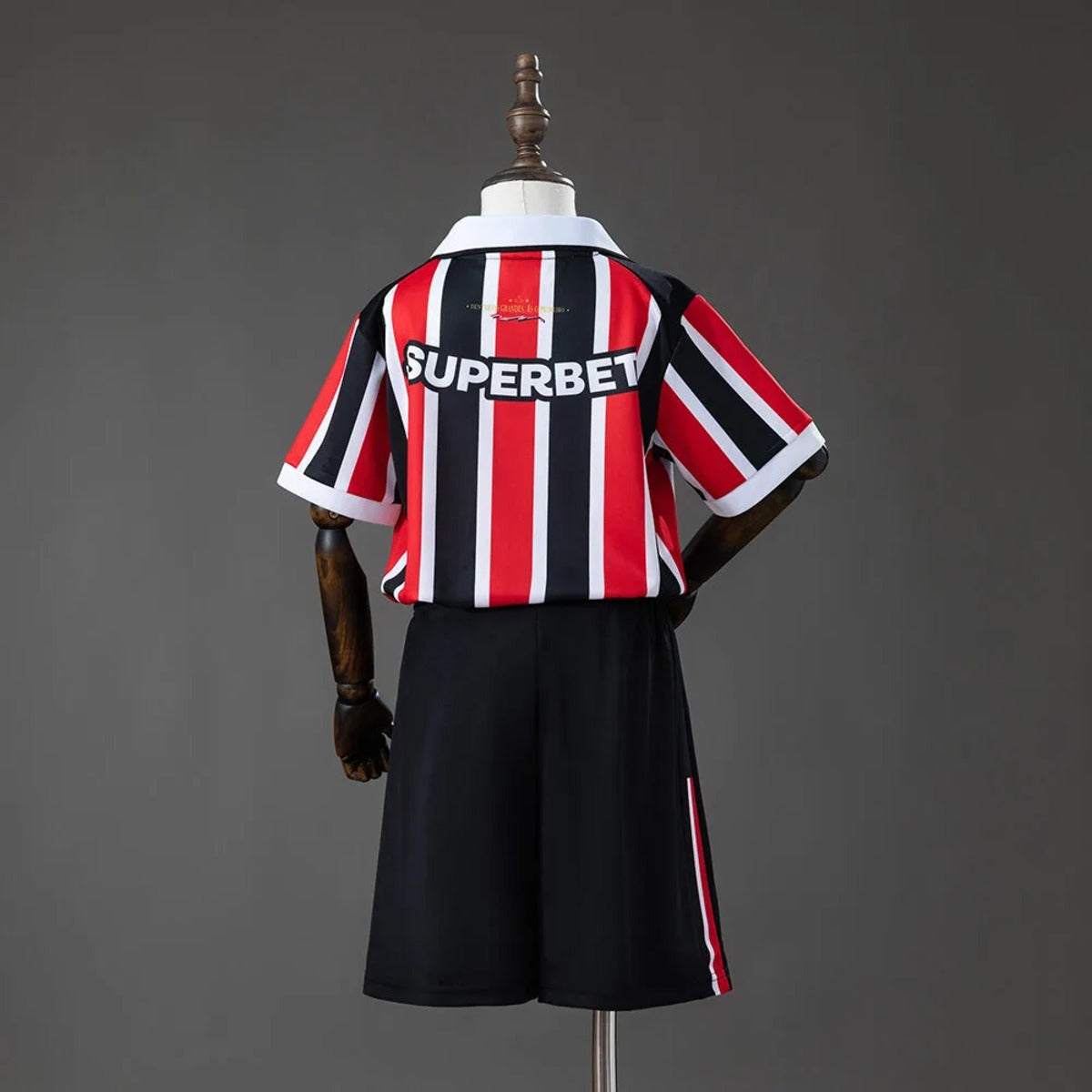 Conjunto Infantil alternativo tricolor 2026/27