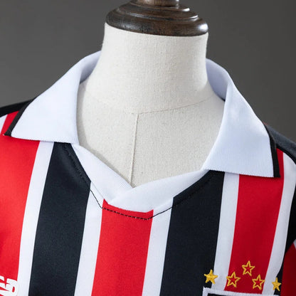 Conjunto Infantil alternativo tricolor 2026/27