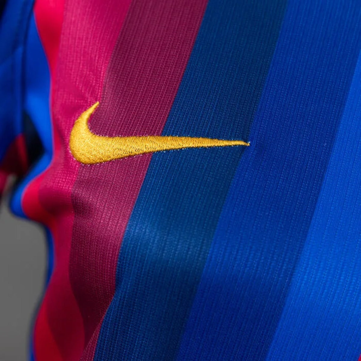 Camisola Barcelona FEMININA home azul e vermelho 2026/27