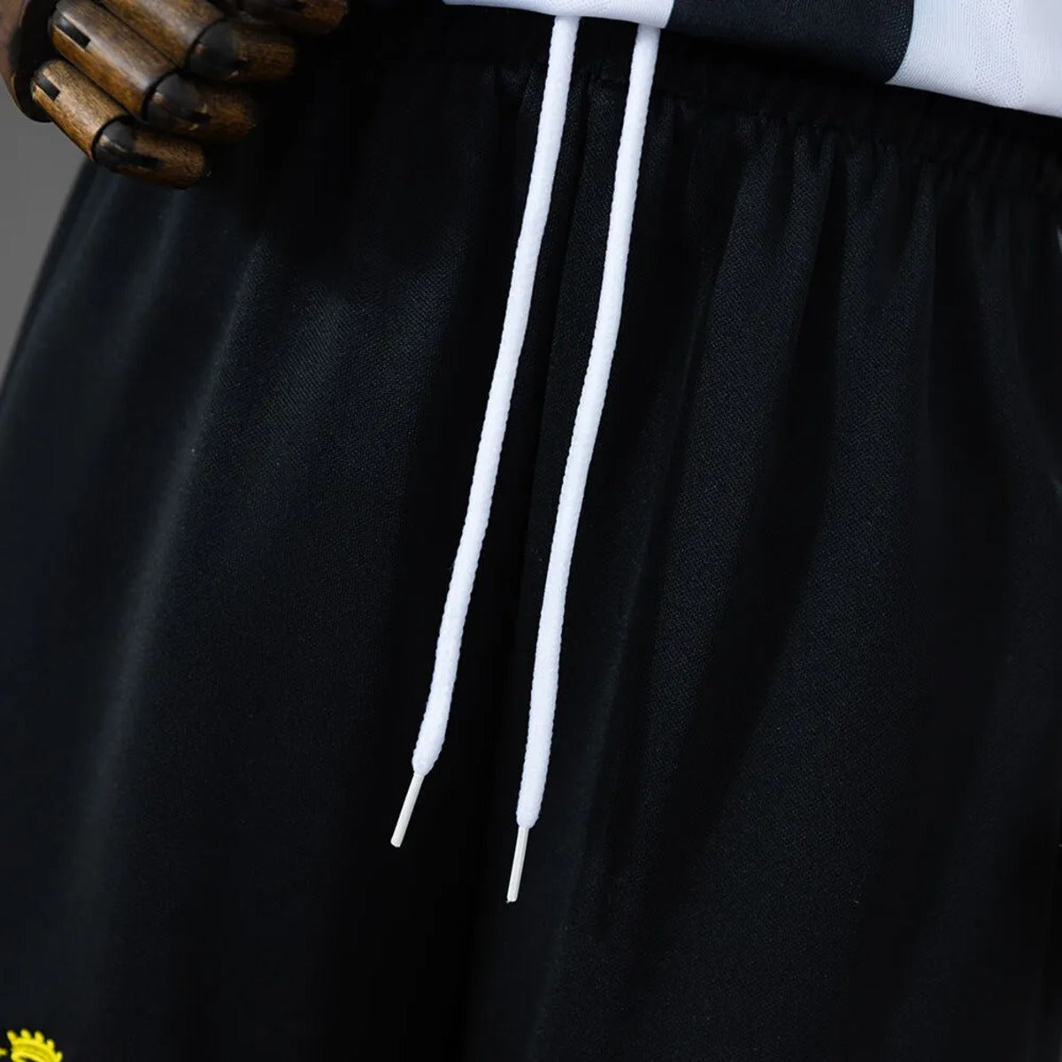 Conjunto Infantil alternativo branco/preto 2026/27