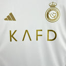 Conjunto infantil Al Nassr branco e dourado 24/25