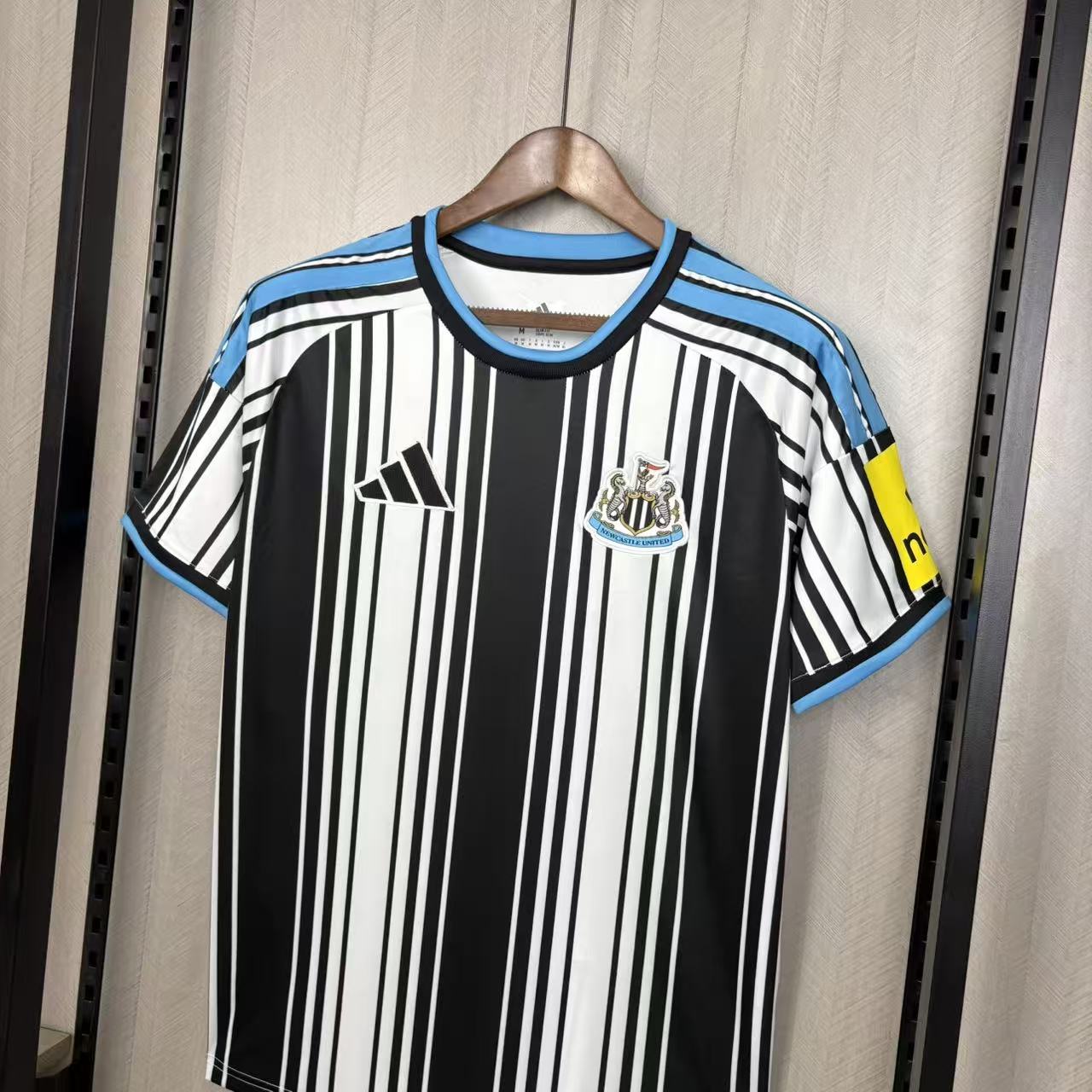 Camisola Newcastle principal 2026/27