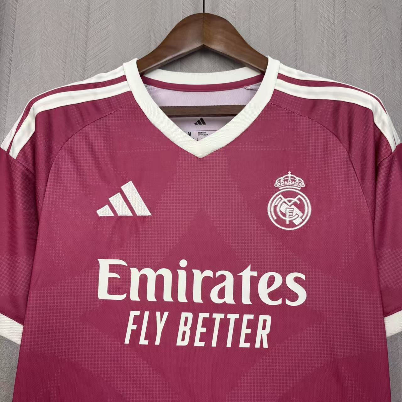Camisola Real Madrid rosa terceira 2026/27