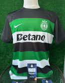 Camisola principal verde/branca/preta 2024/25