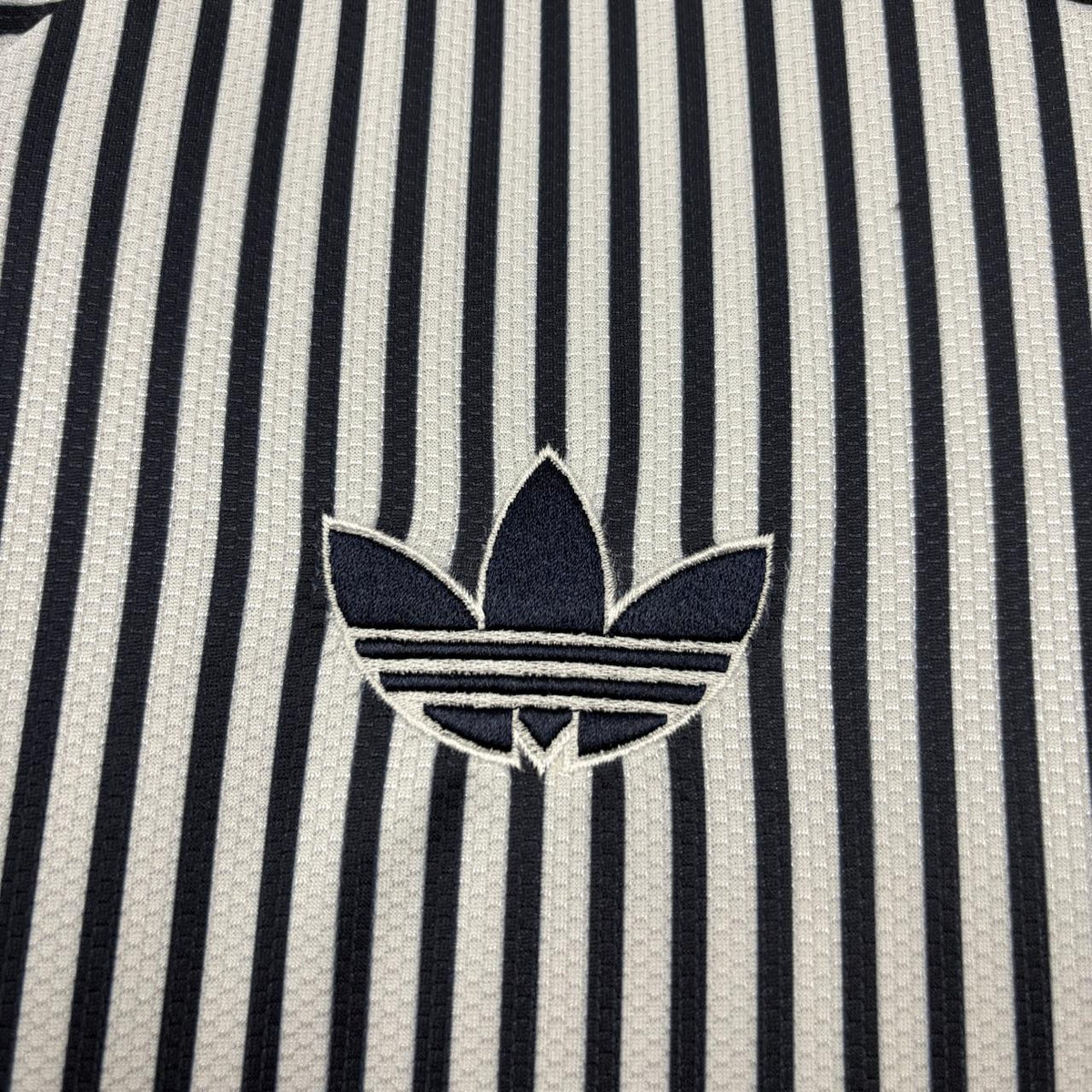Camisola alternativa branca/azul 2026/27