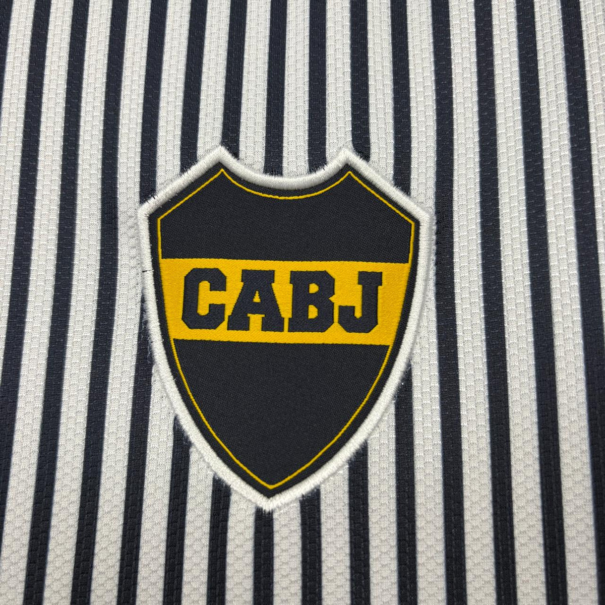 Camisola alternativa branca/azul 2026/27
