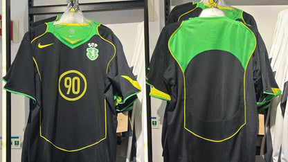 Camisola TOTAL 90 preta simbolo stromp 2026/27 - LANÇAMENTO
