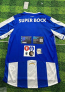 Camisola primeiro equipamento azul/branco 2025/26 simbolo bordado - LANÇAMENTO