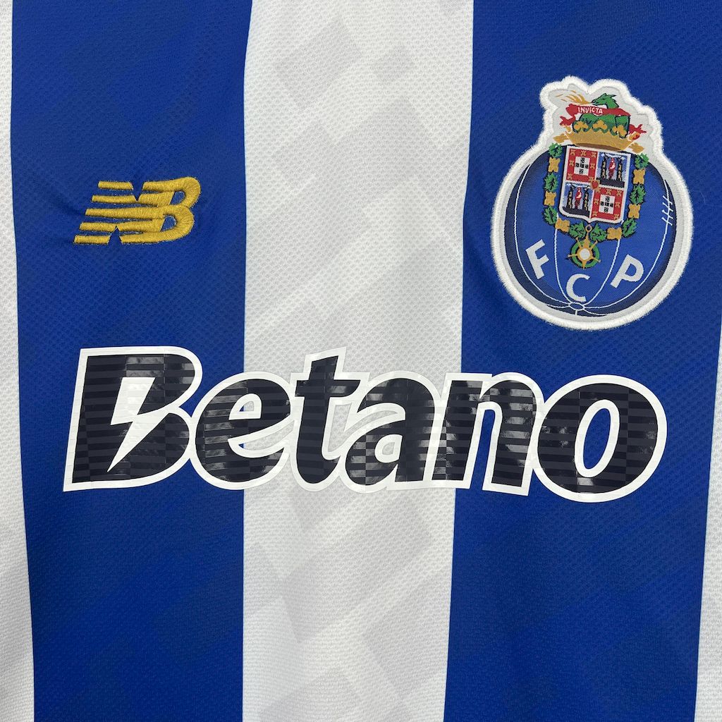 Camisola primeiro equipamento azul/branco 2025/26 simbolo bordado