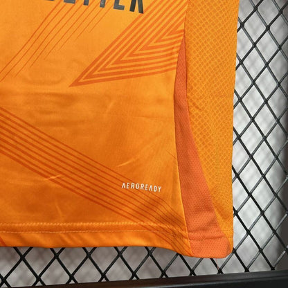 Conjunto Infantil Real Madrid away laranja 2024/25