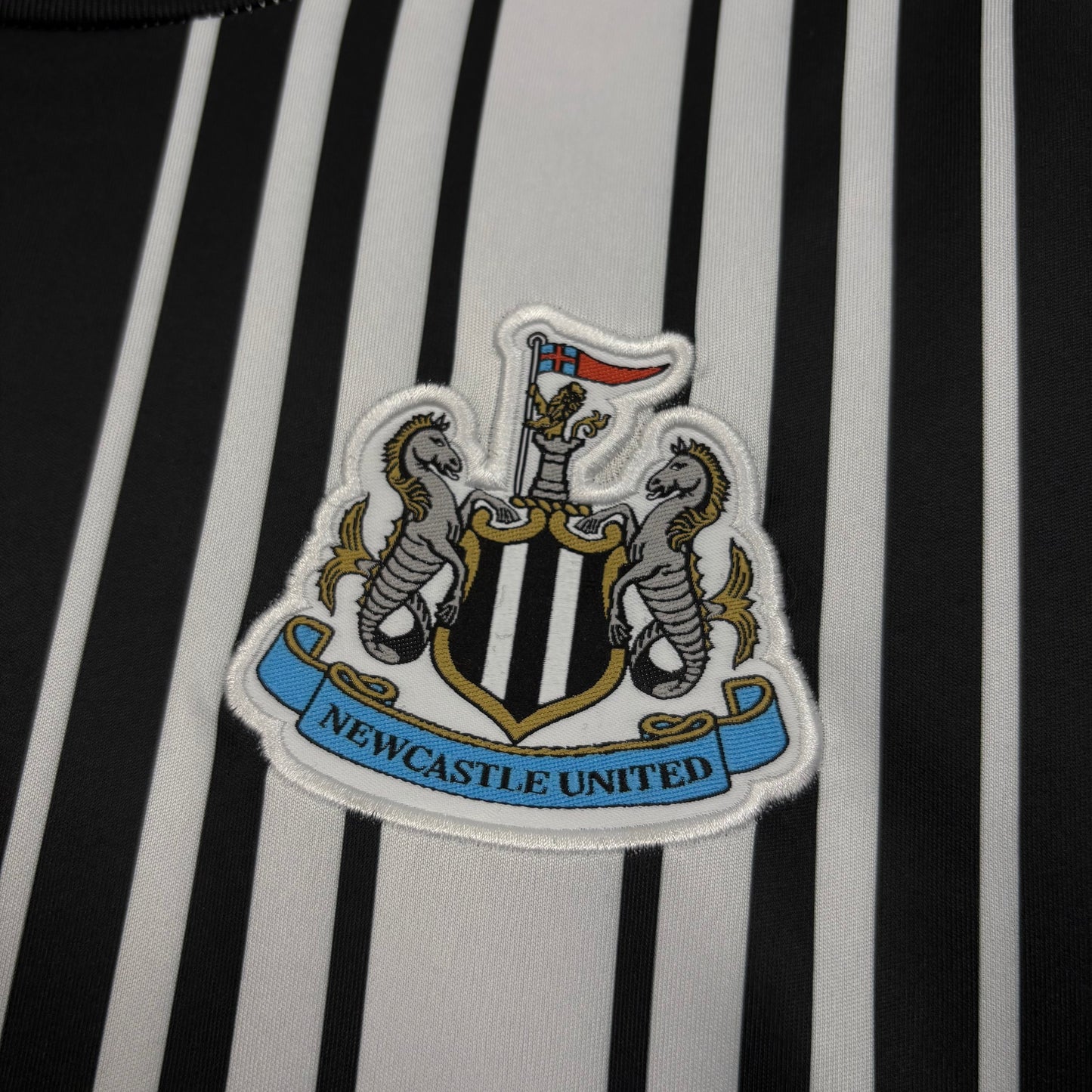 Camisola Newcastle principal 2026/27