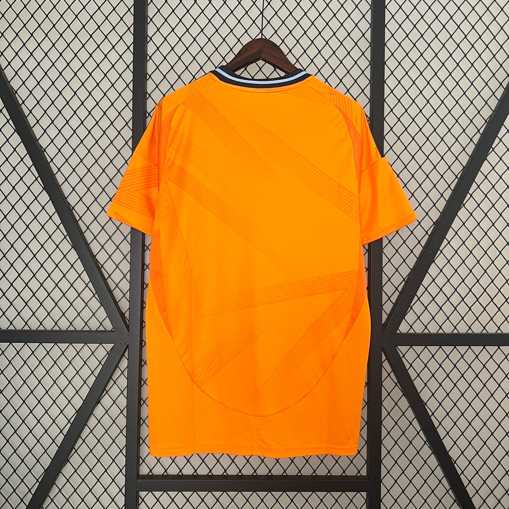 Camisola Real Madrid laranja Away 2024/25