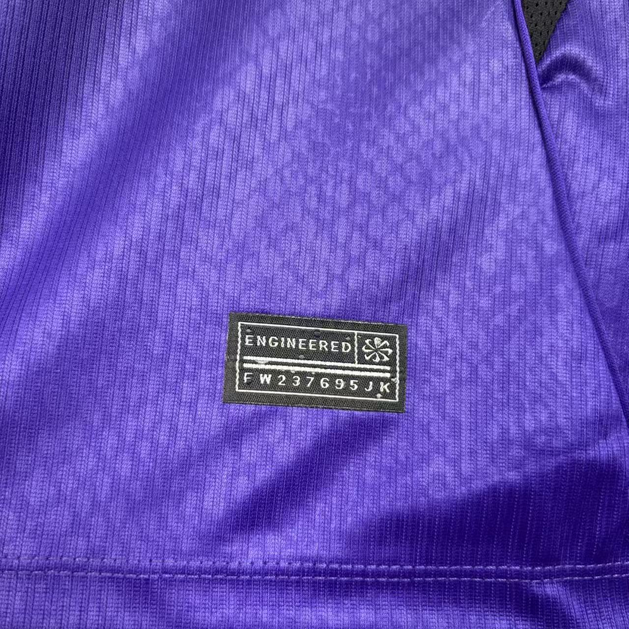 Camisola Barcelona alternativa preta e roxa 2026/27