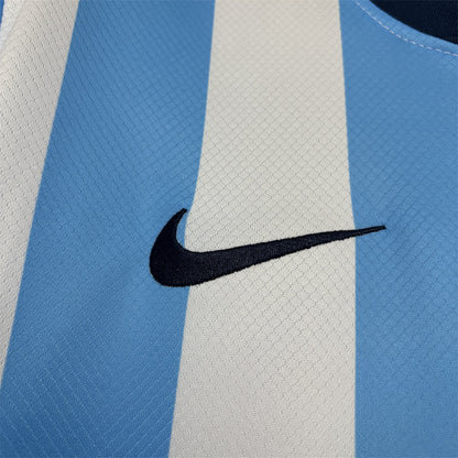 Camisola principal azul/branca 2026/27