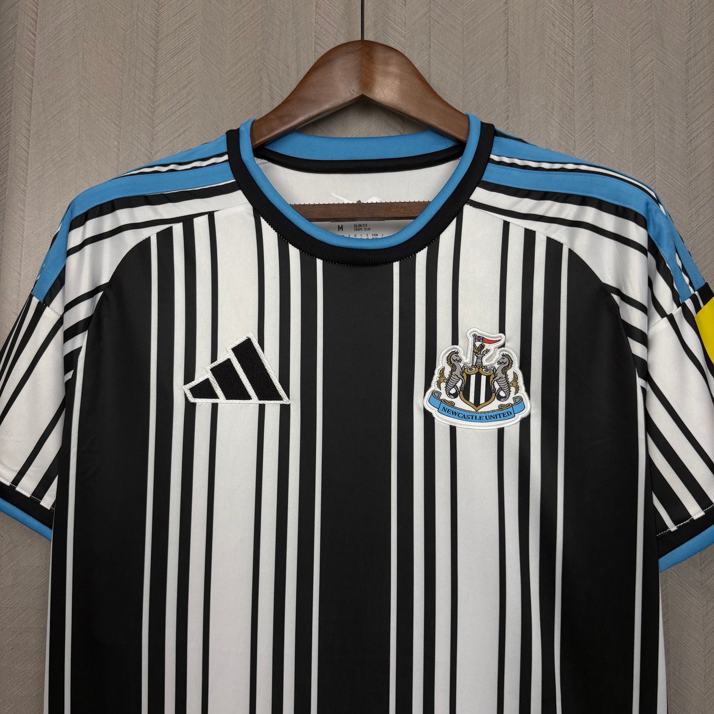Camisola Newcastle principal 2026/27