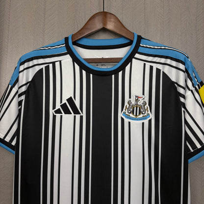 Camisola Newcastle principal 2026/27